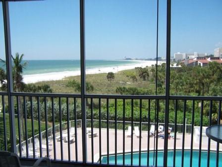 View of pool and the gulf from this vacation condo rental