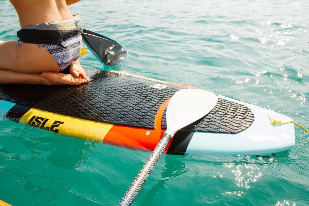 woman on paddleboard on Siesta Key water